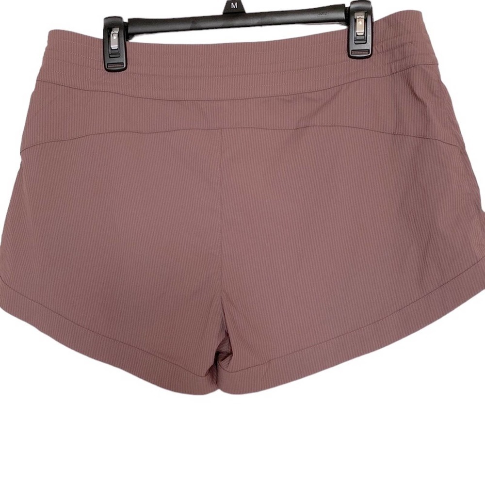 CRZ Yoga Shorts. 2 1/2” inseam. Zip button and drawstring mauve size 14
C - Picture 2 of 8